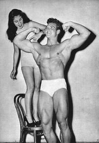 Fitness model points to Steve Reeves Biceps