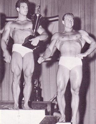 Steve Reeves poses with fellow bodybuilder Alan Stephan