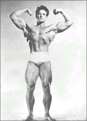 Steve Reeves doing a front double biceps pose